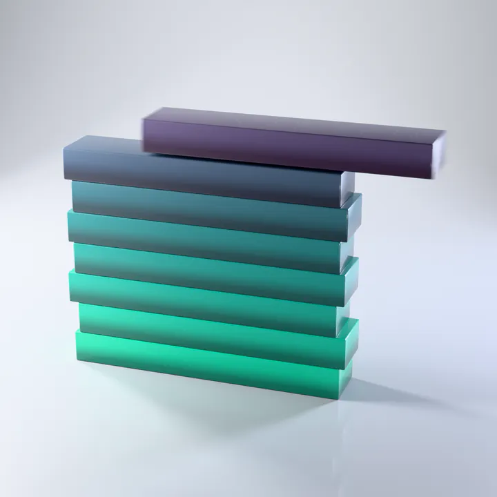A tower of stacked game tiles with the next tile sliding in on top